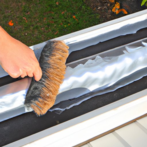 Scrubbing Tiger Stripes with Steel Wool on Aluminum Gutters